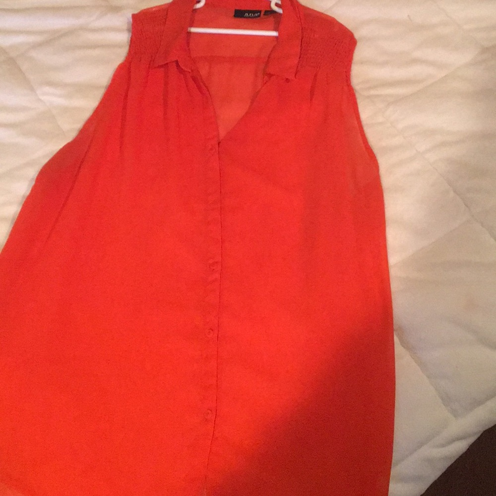 Orange sleeveless blouse